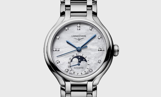 Longines PrimaLuna. Tap to shop.